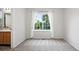 Bright bedroom featuring a large window with backyard views and neutral carpet at 4674 Winona Pl, Broomfield, CO 80020