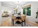 Cozy dining room with bright windows and open to the living room at 4674 Winona Pl, Broomfield, CO 80020