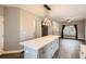 Kitchen island with white quartz countertop and gray cabinets at 19249 E Carolina Dr # 106, Aurora, CO 80017