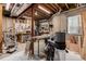 Unfinished basement area with wood working equipment and tool storage, perfect for workshop or hobbies at 6500 W Mansfield Ave # 39, Denver, CO 80235