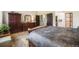 Comfortable primary bedroom featuring elegant furniture and decor creating a cozy and inviting space at 6500 W Mansfield Ave # 39, Denver, CO 80235