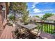 Relaxing outdoor deck area with patio furniture for enjoying time outside in a quiet setting at 6500 W Mansfield Ave # 39, Denver, CO 80235