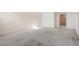 Spacious basement room with carpeted floor at 3230 S Bannock St, Englewood, CO 80110