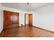 Simple bedroom with hardwood floors and built-in closet at 3230 S Bannock St, Englewood, CO 80110