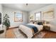 Spacious bedroom with hardwood floors and large windows at 3230 S Bannock St, Englewood, CO 80110