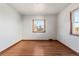 Small bedroom with hardwood floors and a window at 3230 S Bannock St, Englewood, CO 80110