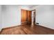 Bedroom with hardwood floors and a closet at 3230 S Bannock St, Englewood, CO 80110