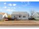 Charming single story home with a well maintained lawn at 3230 S Bannock St, Englewood, CO 80110