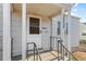 Front door entrance with steps and railings at 3230 S Bannock St, Englewood, CO 80110