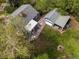 An aerial perspective reveals the main house, detached garage, and private backyard at 1580 Youngfield St, Lakewood, CO 80215