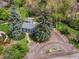 Charming single-story home boasts mature trees and a cozy, welcoming curb appeal at 1580 Youngfield St, Lakewood, CO 80215