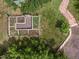 Elevated view of a yard featuring a garden plot and flagstone walkway at 1580 Youngfield St, Lakewood, CO 80215