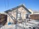 Cozy backyard patio with table and chairs in winter at 4982 W Kentucky Ave, Denver, CO 80219