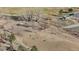 Aerial view of a community dog park with walking paths, trees, and seating areas at 9925 Keenan St, Highlands Ranch, CO 80130