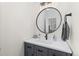 Stylish powder room with modern sink and vanity at 9925 Keenan St, Highlands Ranch, CO 80130