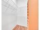 Walk-in closet with wire shelving for optimized storage space, and wood floors at 19075 E Grand Cir, Aurora, CO 80015