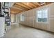 Unfinished basement with sliding glass door, ready to be designed into a cozy space at 5546 Echo Hollow St, Castle Rock, CO 80104