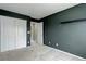 Bedroom with a view to the hallway, closet with sliding doors offering convenient storage solutions at 5546 Echo Hollow St, Castle Rock, CO 80104