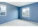 Bedroom with a large window and a view of the neighborhood, creating a bright and airy space at 5546 Echo Hollow St, Castle Rock, CO 80104