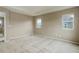 Large bedroom with neutral paint, carpet, and large windows at 5546 Echo Hollow St, Castle Rock, CO 80104