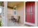 Cozy front porch with seating, perfect for relaxing and enjoying the outdoors at 5546 Echo Hollow St, Castle Rock, CO 80104