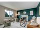 Stylish living room with fireplace, comfortable seating, and elegant decor at 5546 Echo Hollow St, Castle Rock, CO 80104