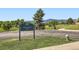Neighborhood park with play area, grassy fields, trees, and mountain views at 7331 S Webster St, Littleton, CO 80128