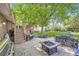 Backyard patio with a fire pit, outdoor furniture, and entertainment space at 7331 S Webster St, Littleton, CO 80128