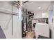Well-maintained utility room with washer, dryer, and water heater at 7331 S Webster St, Littleton, CO 80128