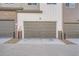 A modern garage provides secure parking and curb appeal at 6817 Huddersfield Ln, Castle Pines, CO 80108