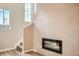 Staircase near electric fireplace at 6817 Huddersfield Ln, Castle Pines, CO 80108