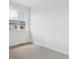 Well-lit bedroom with large window offering views of the neighborhood at 6882 Huddersfield Ln, Castle Pines, CO 80108