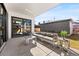 Covered patio with stylish furniture, perfect for outdoor relaxation and gatherings at 2255 S Monroe St, Denver, CO 80210