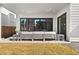 Covered patio with modern seating, ideal for outdoor entertaining and enjoying the backyard at 2255 S Monroe St, Denver, CO 80210