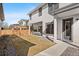 A manicured backyard with a patio, ideal for outdoor relaxation and entertaining at 2255 S Monroe St, Denver, CO 80210