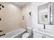 Bathroom featuring a tub, shower and vanity at 2255 S Monroe St, Denver, CO 80210