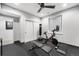 Home gym featuring exercise equipment, ample lighting, and motivational decor at 2255 S Monroe St, Denver, CO 80210