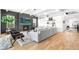 Cozy living room offers a fireplace, modern decor, and sleek hardwood floors at 2255 S Monroe St, Denver, CO 80210