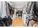 Spacious walk-in closet with custom shelving and ample storage for clothing and shoes at 2255 S Monroe St, Denver, CO 80210