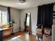 Bright bedroom with large mirror and ample natural light at 985 Xavier St, Denver, CO 80204