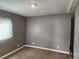 Simple bedroom with gray walls and carpeting at 985 Xavier St, Denver, CO 80204