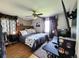 Cozy bedroom with wood floors and a comfortable bed at 985 Xavier St, Denver, CO 80204