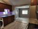 Modern kitchen with stainless steel appliances and wood cabinets at 985 Xavier St, Denver, CO 80204