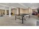Spacious basement featuring carpeted floors, ping pong table and an exercise area at 24317 E Powers Ave, Aurora, CO 80016
