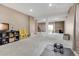 Spacious basement featuring carpeted floors, structural columns, and recessed lighting at 24317 E Powers Ave, Aurora, CO 80016