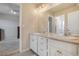 Spacious bathroom features double sinks, modern fixtures, and neutral walls at 24317 E Powers Ave, Aurora, CO 80016