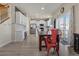 Open concept dining area with ample natural light and a seamless transition to the modern kitchen at 24317 E Powers Ave, Aurora, CO 80016