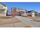 Charming home with a well-manicured front yard and inviting curb appeal at 24317 E Powers Ave, Aurora, CO 80016