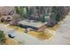 Aerial view of a charming single-story home with well-manicured landscaping and mature trees at 456 Cherry Street, Denver, CO 80220