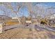 Backyard patio with seating area, swing set, and fire pit at 10826 Livingston Dr, Northglenn, CO 80234